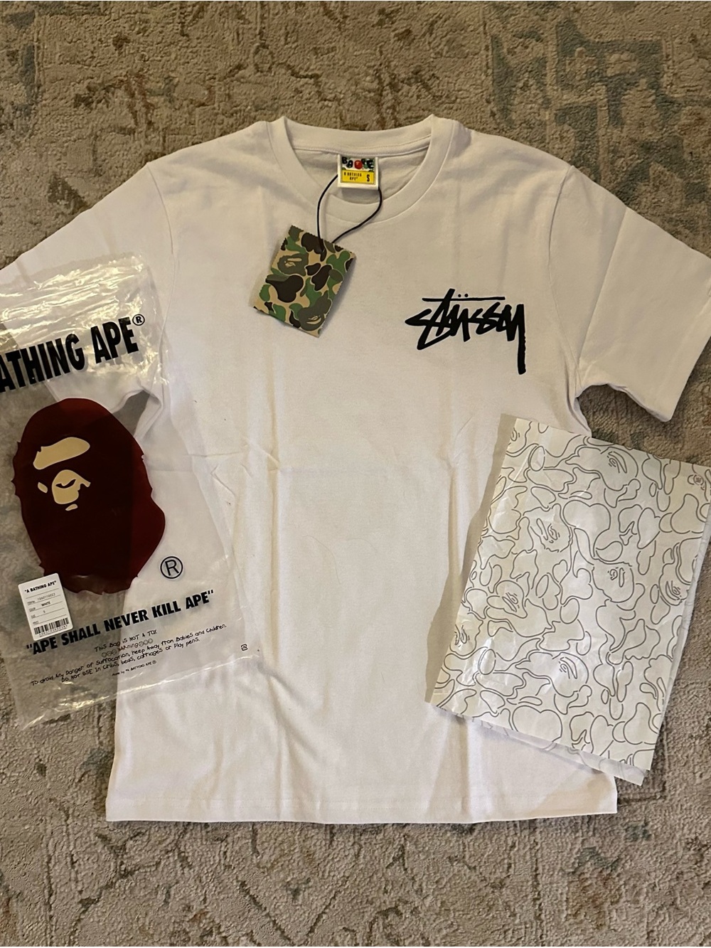 Bape White Short Sleeve Tee with Black Chest Logo